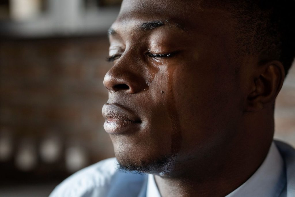 A man crying.