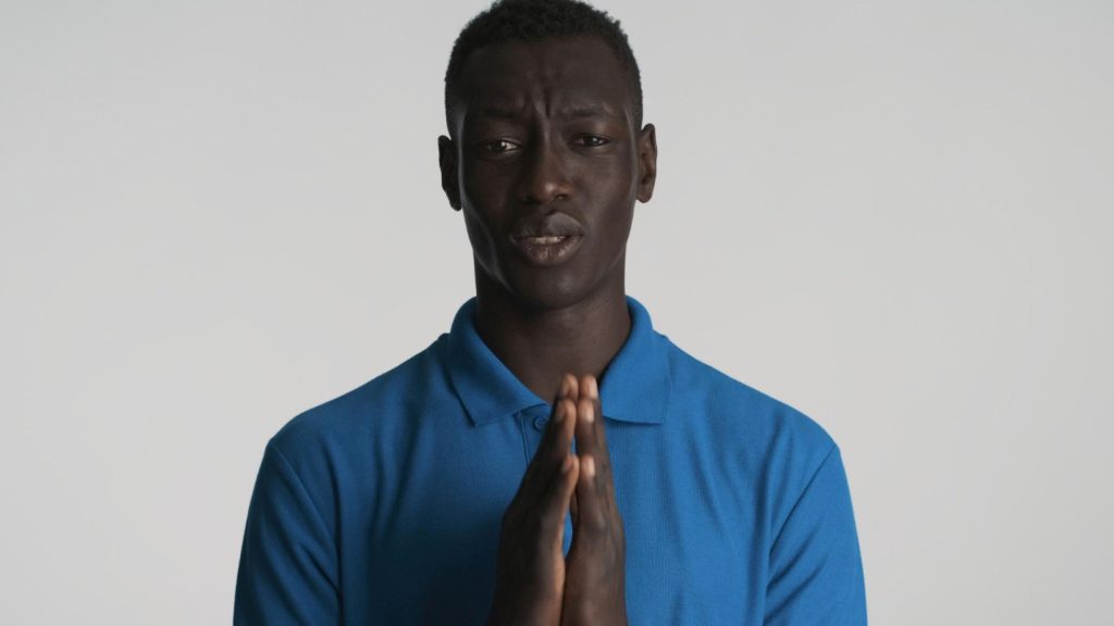 A man praying for safety.