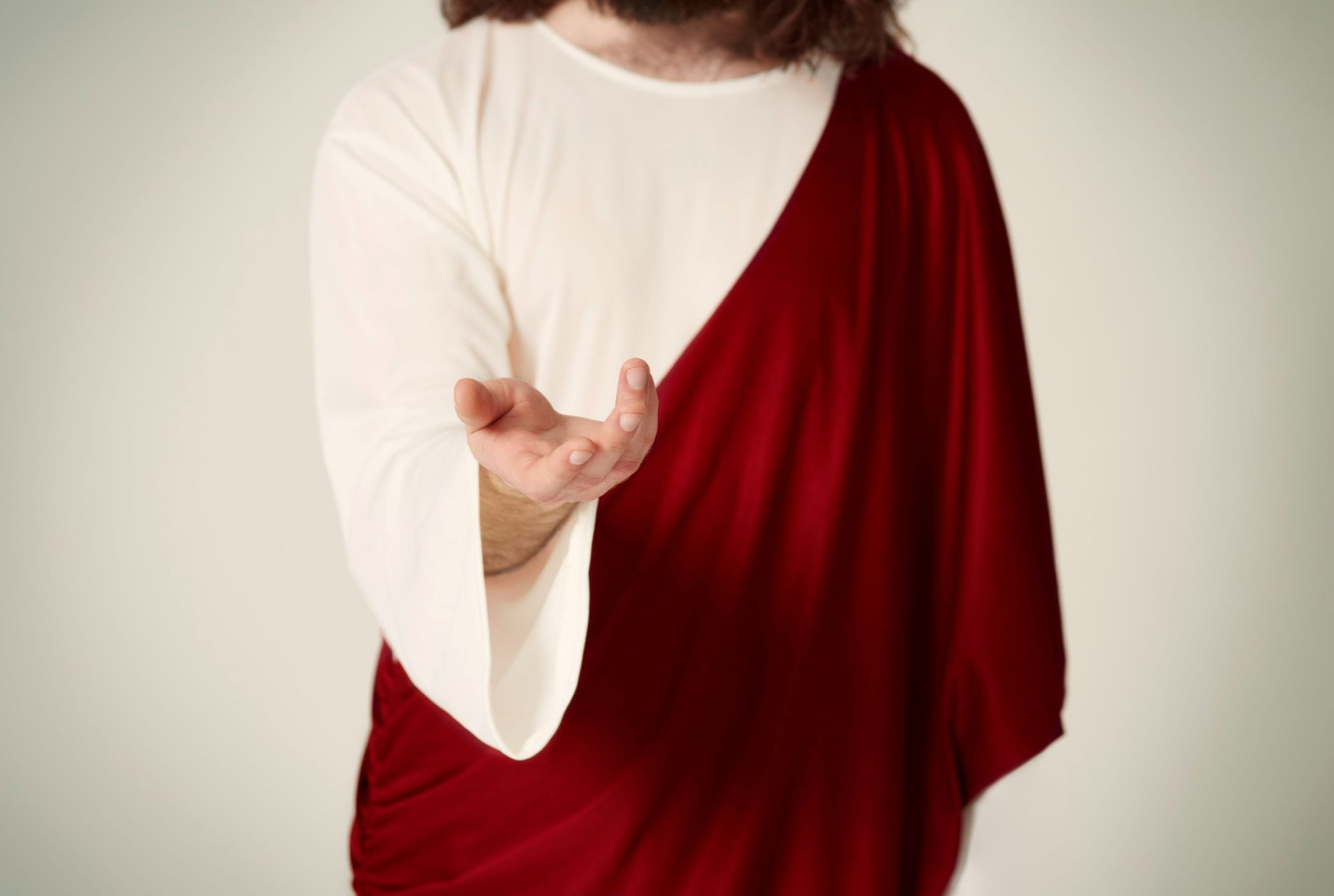 Redemption through Christ: the only path from curse to eternal life. Christ reaching out towards the faithful.